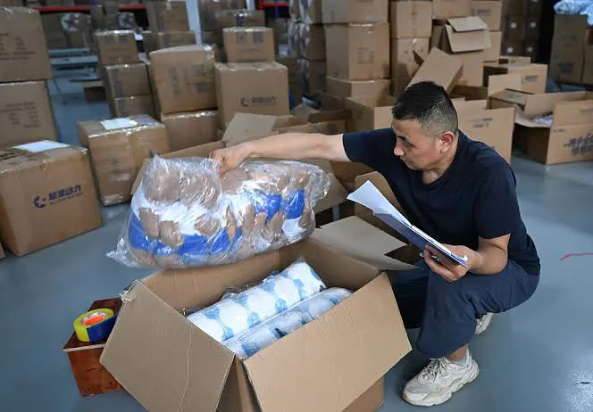 Stacked cartons prepared for packaging and warehouse handling.