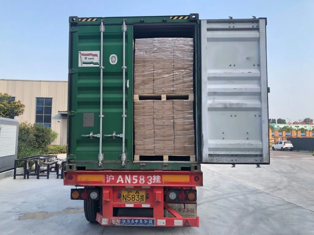 Packed cartons arranged for shipping preparation in a logistics facility.
